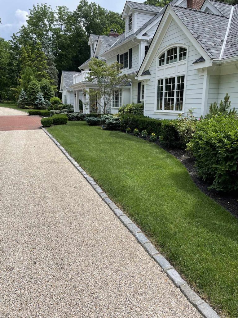 Coastal Turf Solutions path grass house